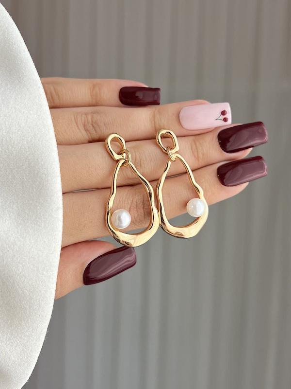 گوشواره ژوپینگ دفرمه طلایی