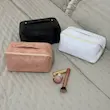 کیف آرایش چرم طرح دار