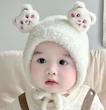 کلاه گوشدار عروسکی، نوزادی تا بکسال