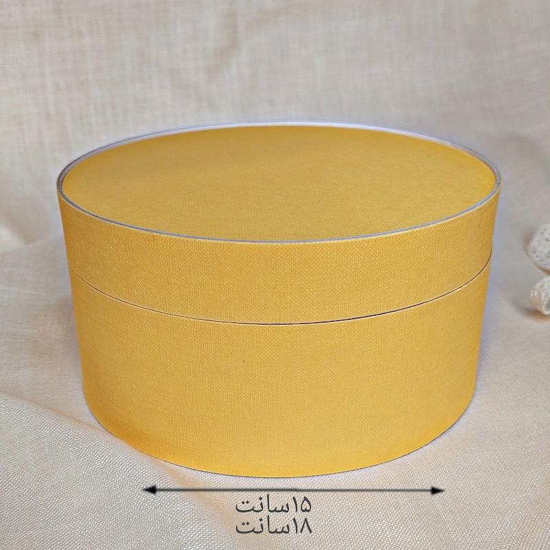 جعبه هدیه با رنگ زرد درخشان کوبه استودیو koobestudio gift box