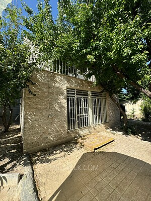 باغ شهرکی با بنا قدیمی در لم آباد ملارد کد:0102