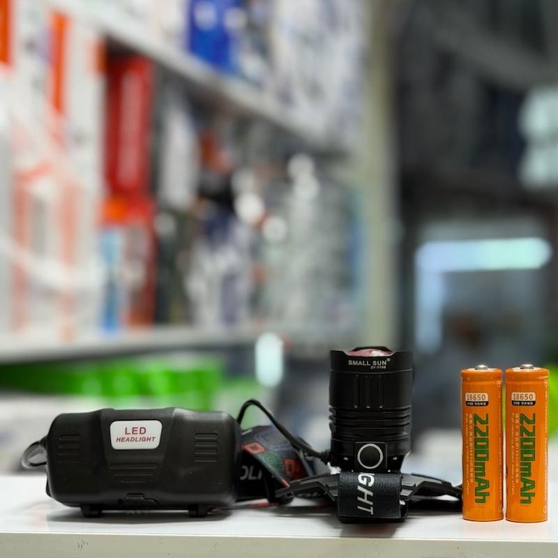 چراغ پیشانی زوم دار اسمال سان مدل ZY-T706 با لامپ LED مهتاب و جفت باطری قابل تعویض