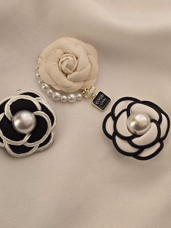 سنجاق سينه گل شنل