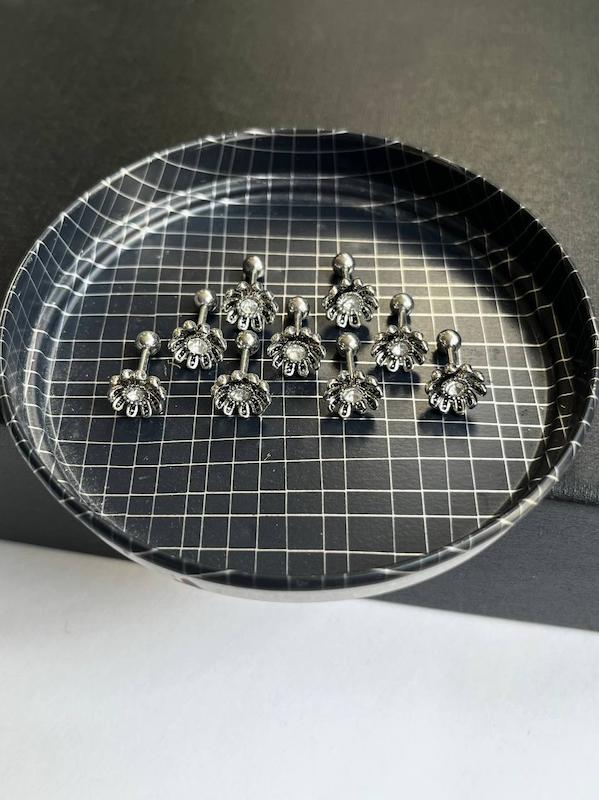 پیرسینگ پیچی بابونه