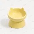 ظرف آب و غذای سرامیکی پایه‌دار گوش‌گربه‌ای رنگ زرد