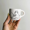 Abolhoul drinks coffee