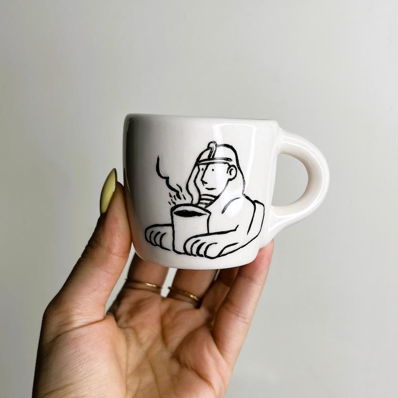 Abolhoul drinks coffee