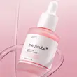 سرم روشن‌کننده مدی کیوب PDRN Pink Peptide در نمای تبلیغاتی صورتی