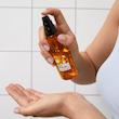 روغن مو گلیس Daily Oil-Elixir با پمپ در دست