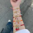 دستبند تابستانی آویزدار ماهلین اکسسوری
