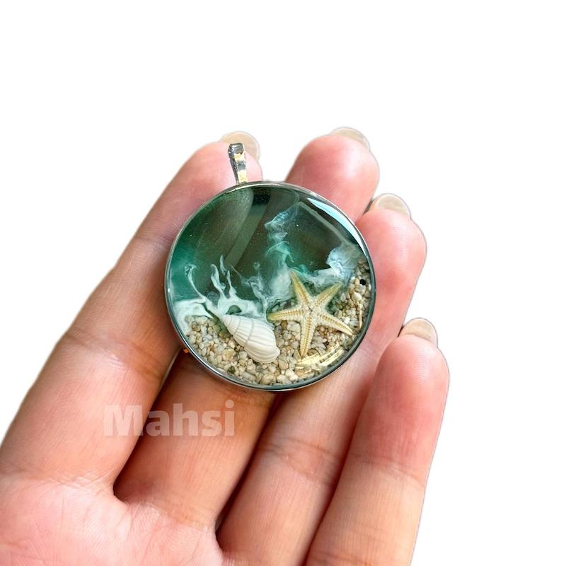 پلاک  دریا رزینی با صدف و ماسه طبیعی 