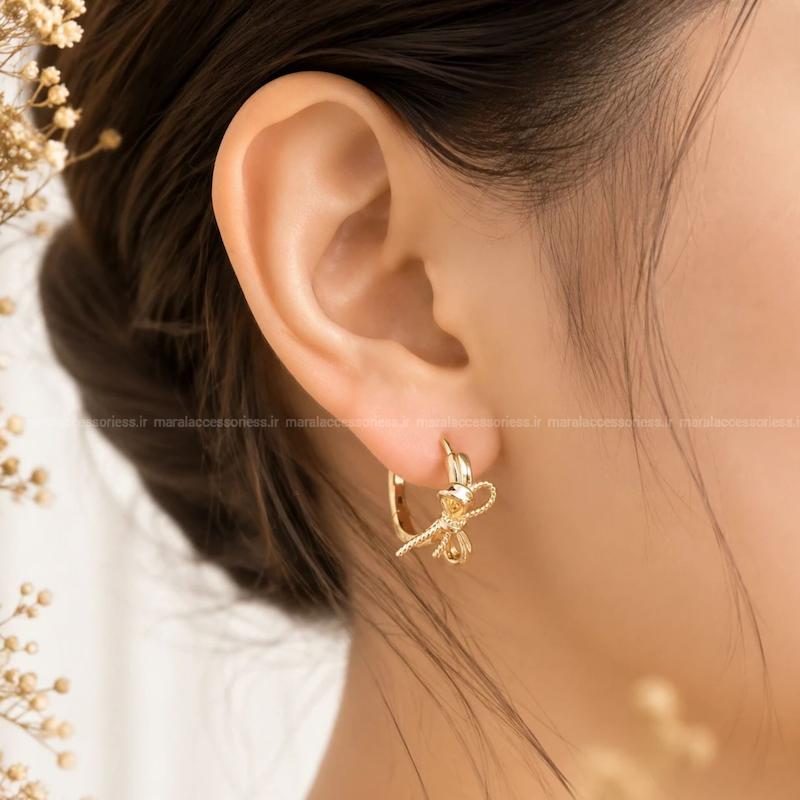 گوشواره زنانه ژوپینگ مدل پاپیون طلایی – کد 1120
