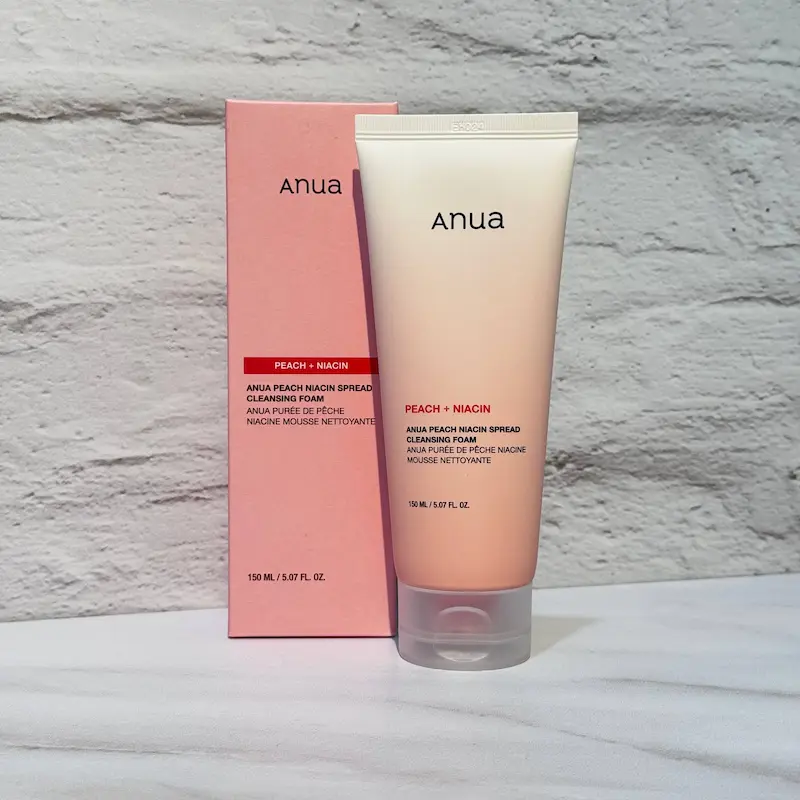 فوم شستشوی صورت هلو و نیاسین صورتی آنوا 150 میل Anua Peach Niacin Spread Cleansing Foam 