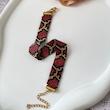 دستبند زنانه میوکی مدل پوست ماری 8