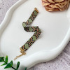دستبند زنانه میوکی مدل پوست ماری 8