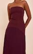 پیراهن ماکسی زنانه دکلته پلیسه‌ای از پرتی لیتل سینگز انگلیس PRETTYLITTLETHING Plum Woven Bandeau Pleated Hem Detail Maxi Dress