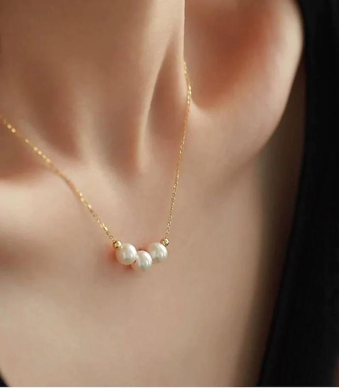 گردنبند مرواريد و گوي 