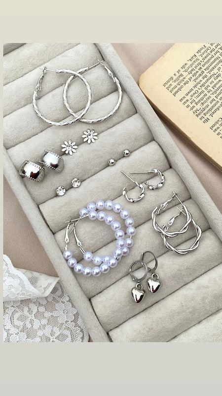 پك گوشواره نقره اي خوشگلترين