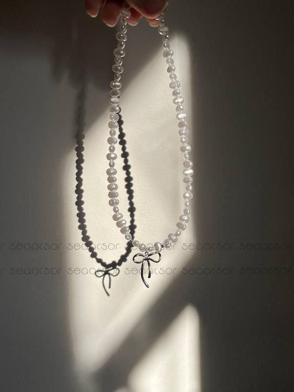 مروارید دفرمه و پاپیون