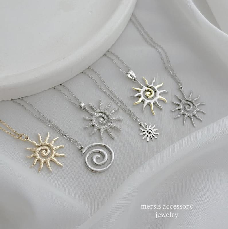 کالکشن گردنبند خورشید پیچ