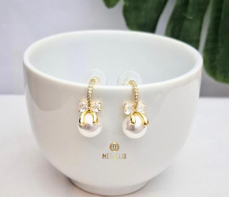 گوشواره های مروارید تیتانیوم 