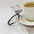 دستبند چرم و طلا زنانه طرح امگا کد MT2271