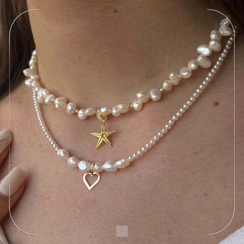 گردنی مروارید ستاره دریایی و گوی
