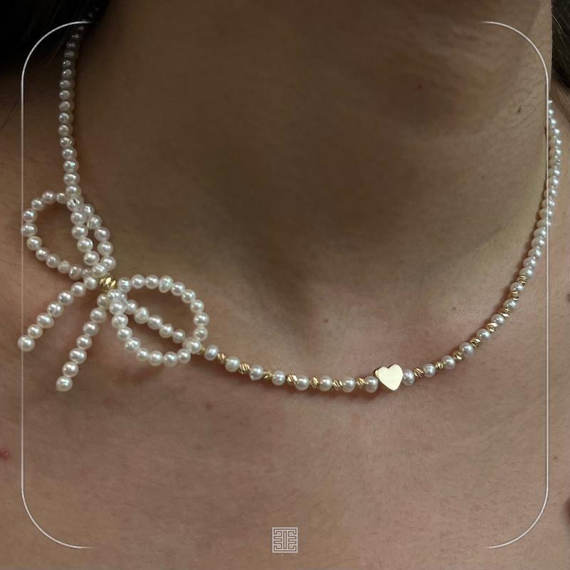 گردنی مرواریدی پاپیون