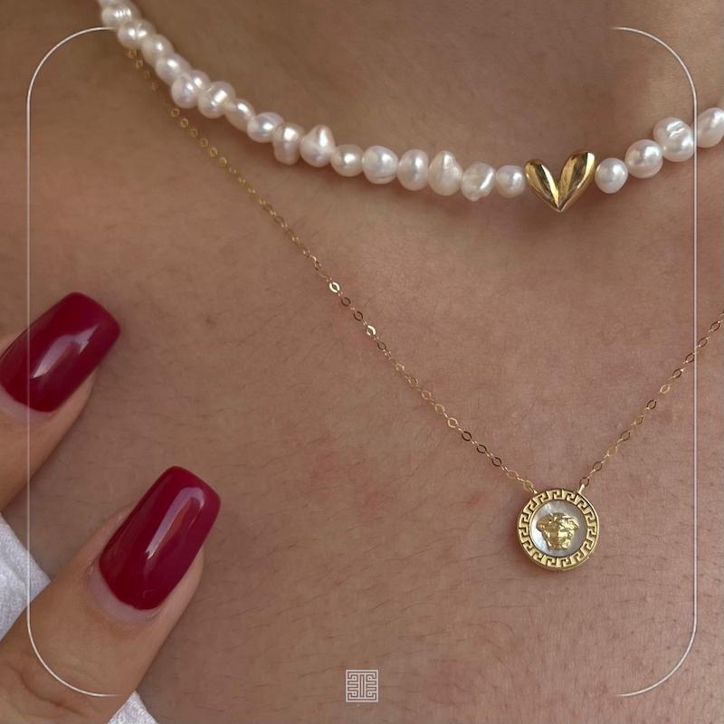 گردنی متصل ورساچ