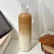 بطری آب شفاف با نشانگر زمان