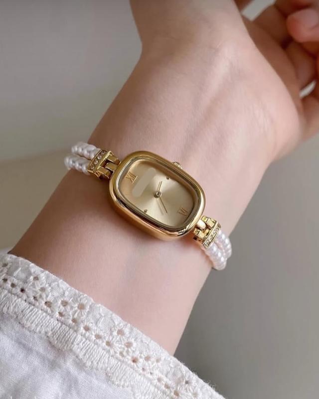 ساعت مرواریدی طلایی صفحه سفید 