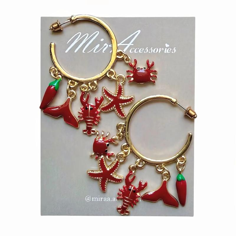 گوشواره حلقه ای با چارم قرمز دریایی