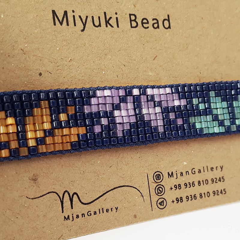 M0135 _ دستبند سرمه ای بنفش نارنجی سبز ( منجوق میوکی و ابریشمی ) 8 رج 8رج هشت