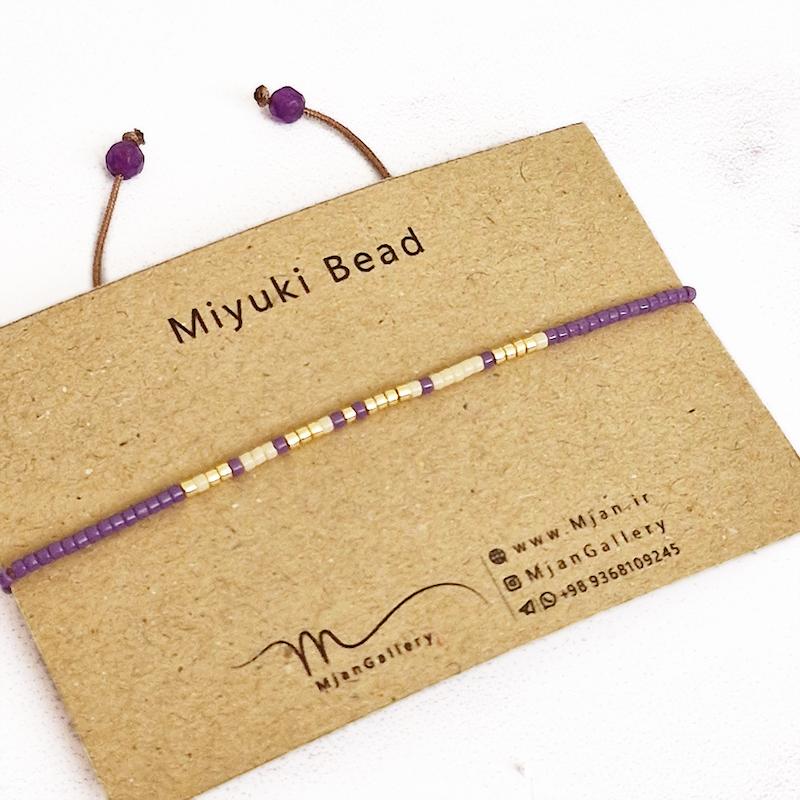 M0330 _ دستبند مورس بنفش، کرم و طلایی 1 رج ( منجوق میوکی )