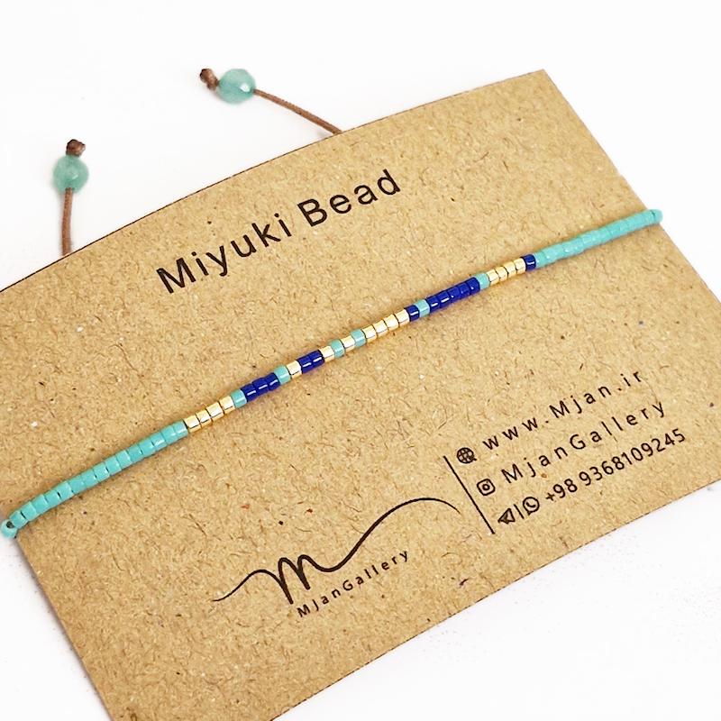 M0334 _ دستبند مورس فیروزه ای، کاربنی و طلایی 1 رج ( منجوق میوکی )