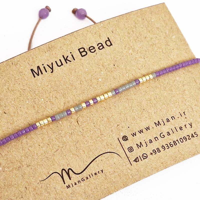 M0340 _ دستبند مورس بنفش، طوسی و طلایی 1 رج ( منجوق میوکی )