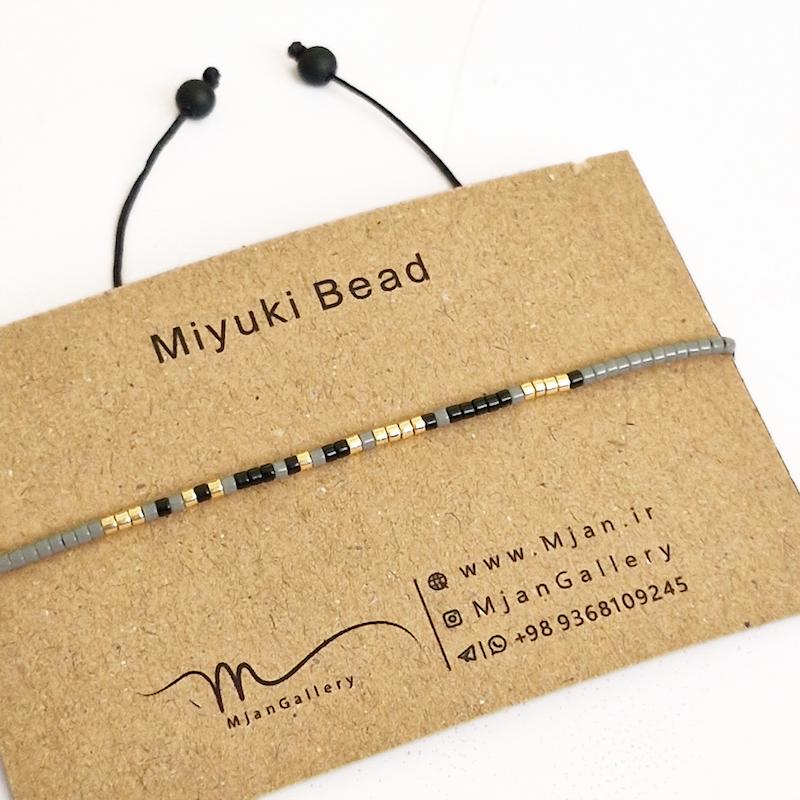 M0342 _ دستبند مورس طوسی، مشکی و طلایی 1 رج ( منجوق میوکی )