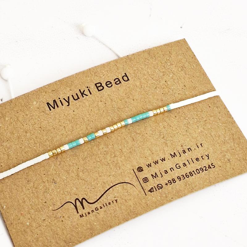 M0343 _ دستبند مورس سفید، فیروزه ای و طلایی 1 رج ( منجوق میوکی )