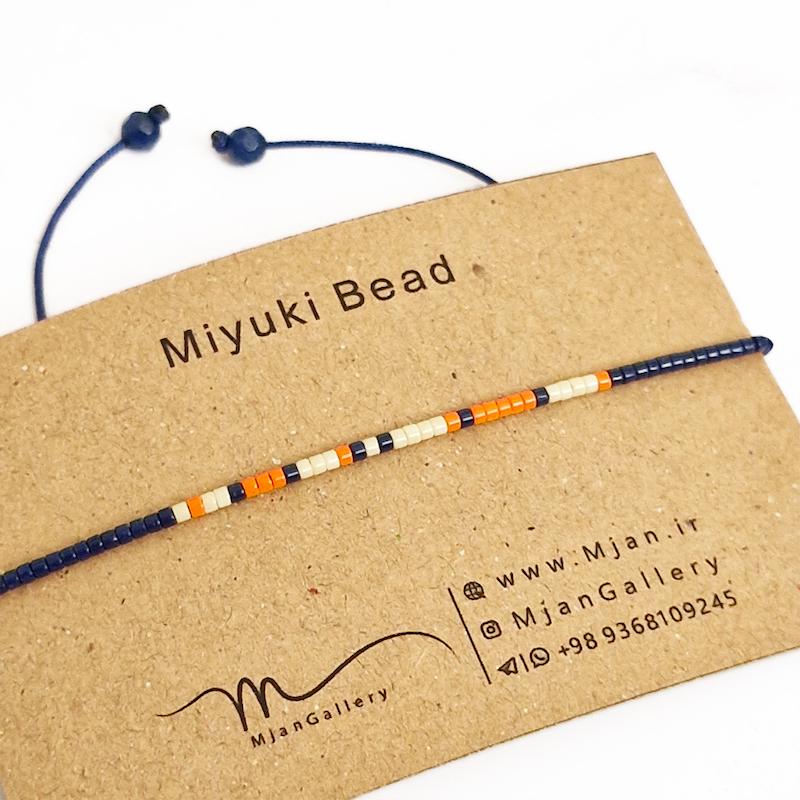 M0347 _ دستبند مورس سرمه ای، نارنجی و کرم 1 رج ( منجوق میوکی )