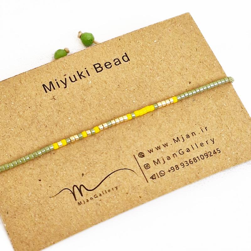 M0348 _ دستبند مورس سبز، زرد و طلایی 1 رج ( منجوق میوکی )