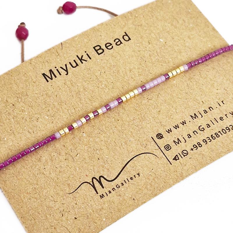 M0362 _ دستبند مورس صورتی پررنگ، بنفش و طلایی 1 رج ( منجوق میوکی )