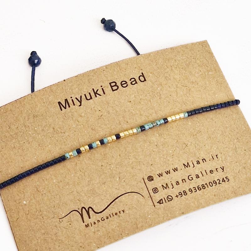 M0363 _ دستبند مورس سرمه ای، فیروزه پیکاسو و طلایی 1 رج ( منجوق میوکی )