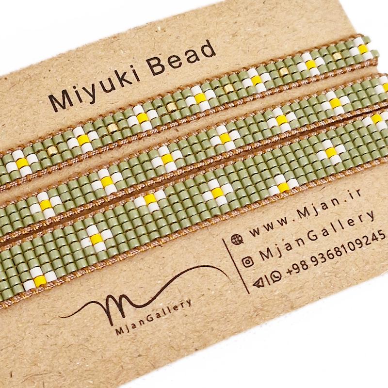 M0137 _ دستبند سبز و سفید بابونه 5 رج و 3 رج ( منجوق میوکی )