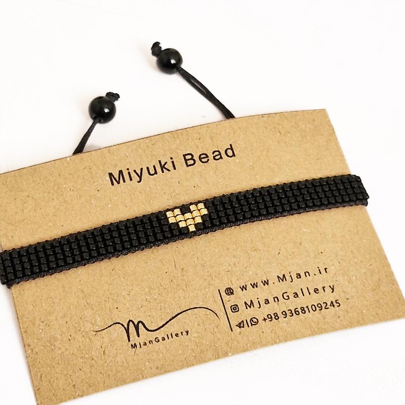 M0748 _ دستبند مشکی با قلب طلایی، 4 رج ( منجوق میوکی )