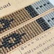 M0595 _ دستبند برنز مشکی و طوسی ( منجوق میوکی ) 7 رج 