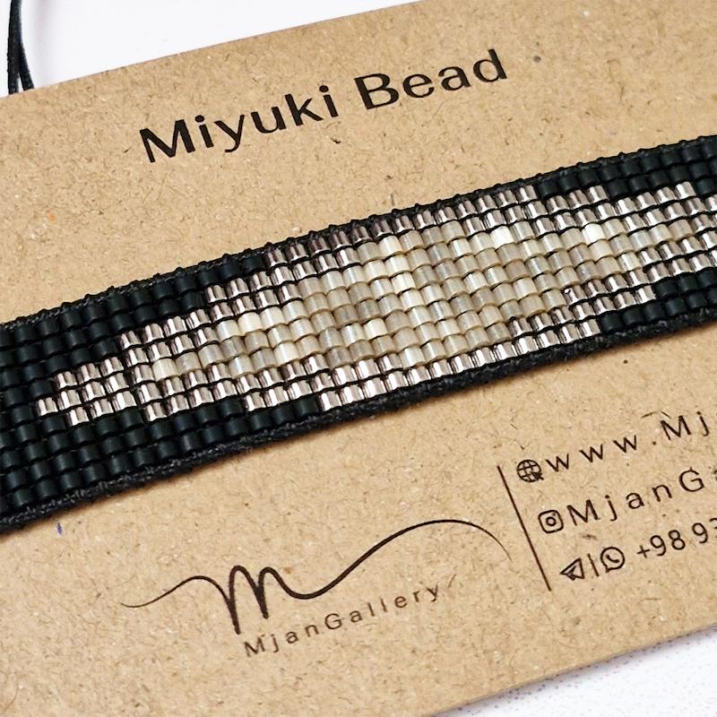 M0603 _ دستبند با طرح مینیمال مشکی نقره ای و کرم ( منجوق میوکی و ابریشمی ) 9 رج 