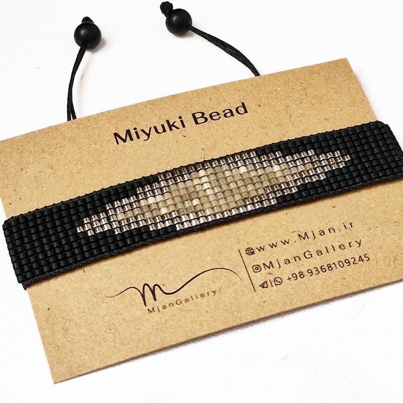 M0603 _ دستبند با طرح مینیمال مشکی نقره ای و کرم ( منجوق میوکی و ابریشمی ) 9 رج 