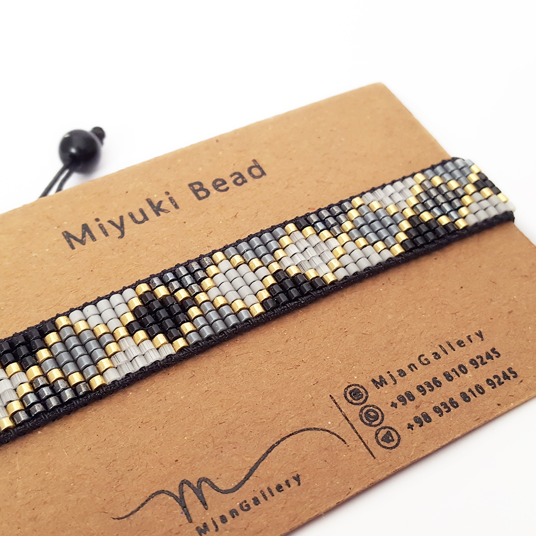 M0090 _ دستبند مشکی طوسی 7 رج ( منجوق میوکی و ابریشمی )