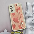 قاب گوشی Galaxy A34 5G سامسونگ دستبندی سیلیکونی فانتزی Fashion محافظ لنز دار طرح قلبی صورتی کد 606