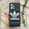 قاب گوشی Poco X5 - Redmi Note 12 5G شیائومی سیلیکون ژله ای طرح آدیداس adidas پافر PC زیر بسته محافظ لنز دار مشکی کد 296